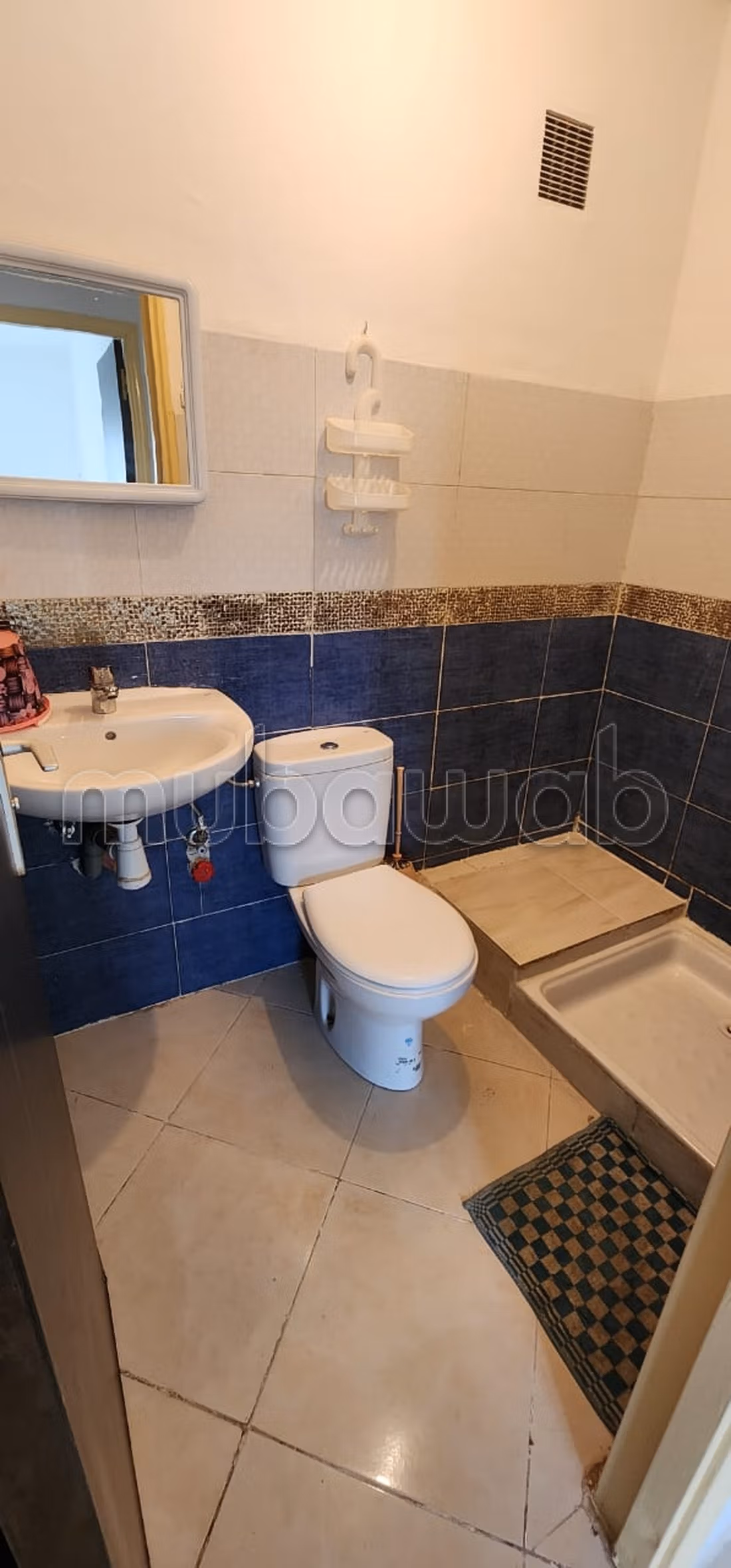 Apartment for rent by the month at Al Baraka complex in Aouama