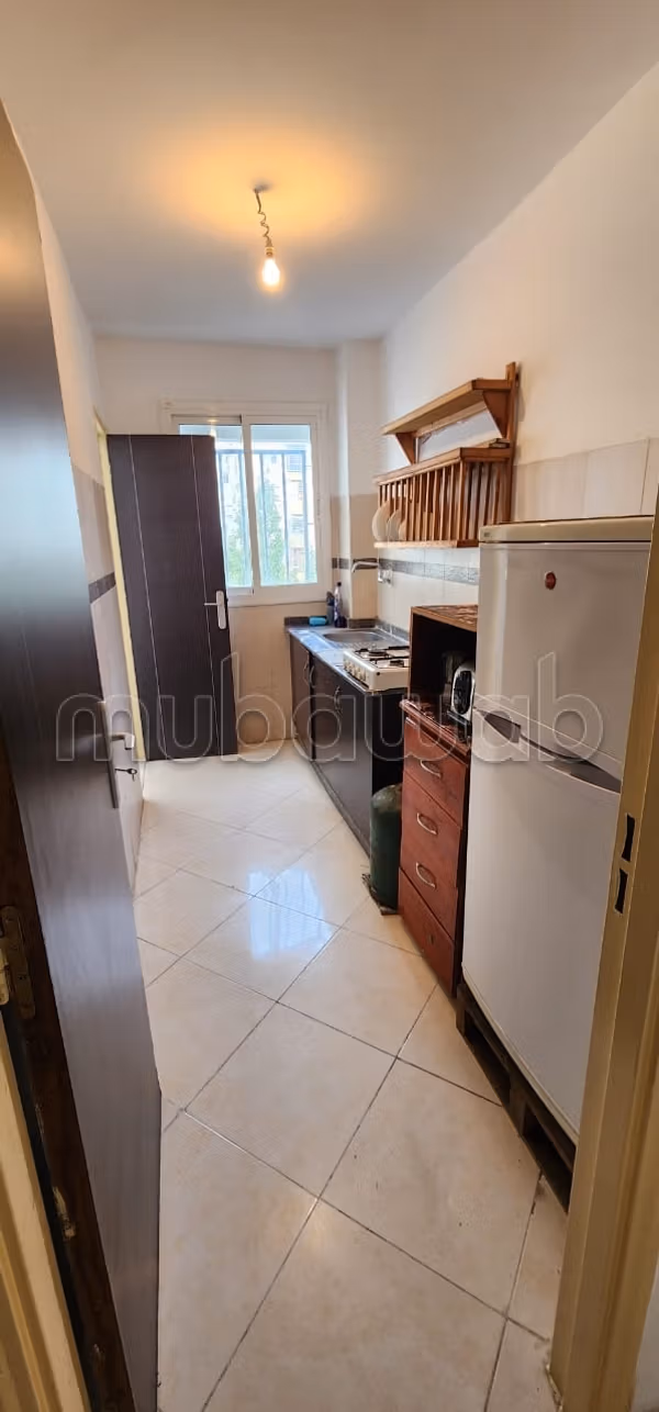 Apartment for rent by the month at Al Baraka complex in Aouama