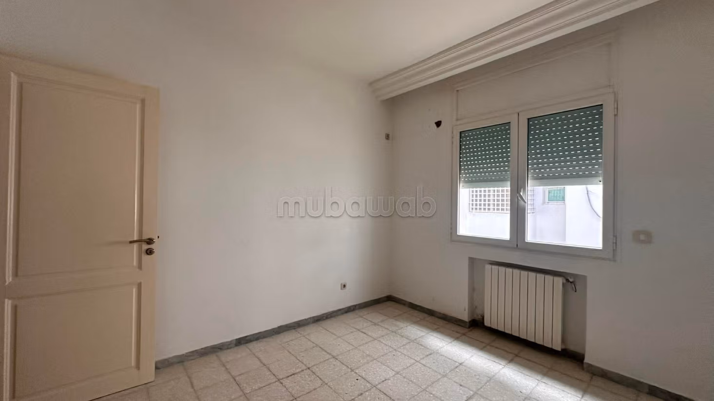 A vendre S2 titré 100 m2 parking SS à Ennasr 2