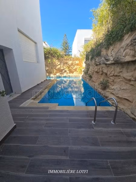 Magnificent villa for rent in Cité Les Pins. 8 rooms. Fireplace, swimming pool