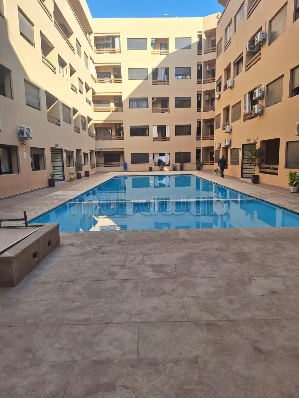 Séjour de vacances à louer à Guéliz. 1 belle chambre. Piscine et service de Conciergerie