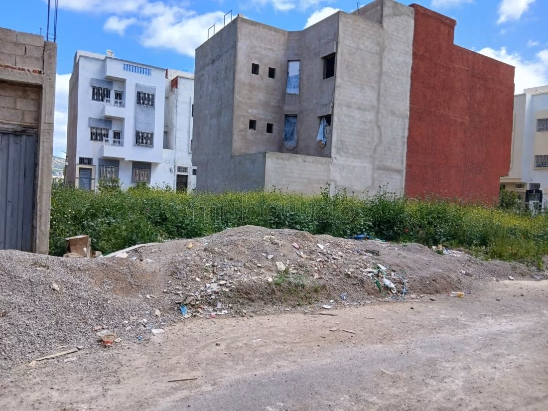 Vente de 2 lots mitoyens