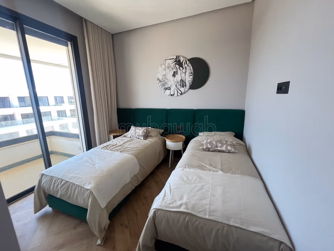 Ain diab extension: appartement de 103 m2 en location. 3 chambres. Meublé dans Résidence avec piscines — 6