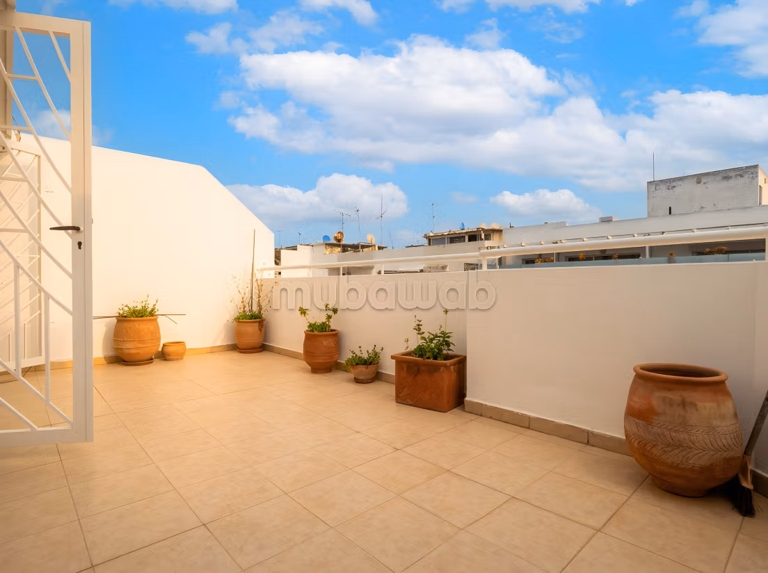 Appartement a louer a Agdal Avenue Atlas 2 chambres terrasse 4eme etage ascenseur garage — 3
