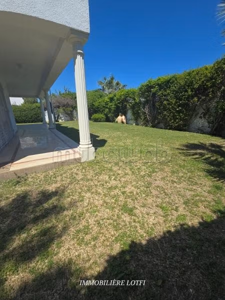 Maison avec grand jardin et vue mer
