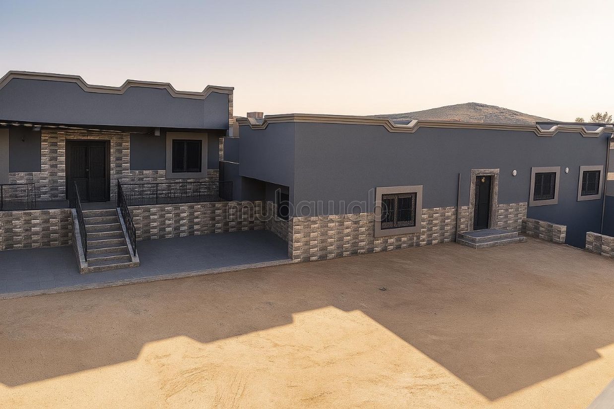 Terreno con 3 casas en venta