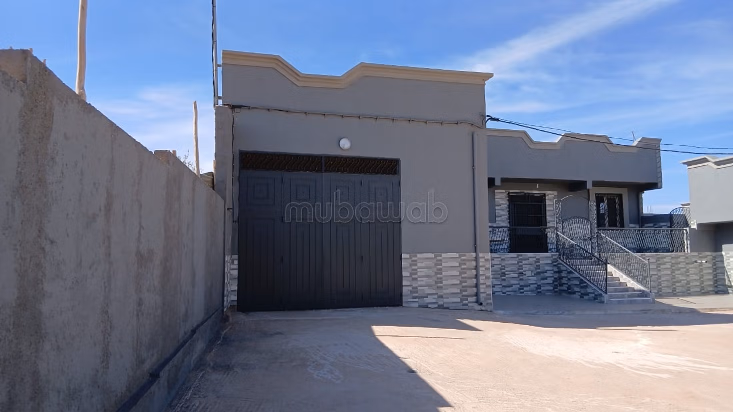 Terreno con 3 case in vendita