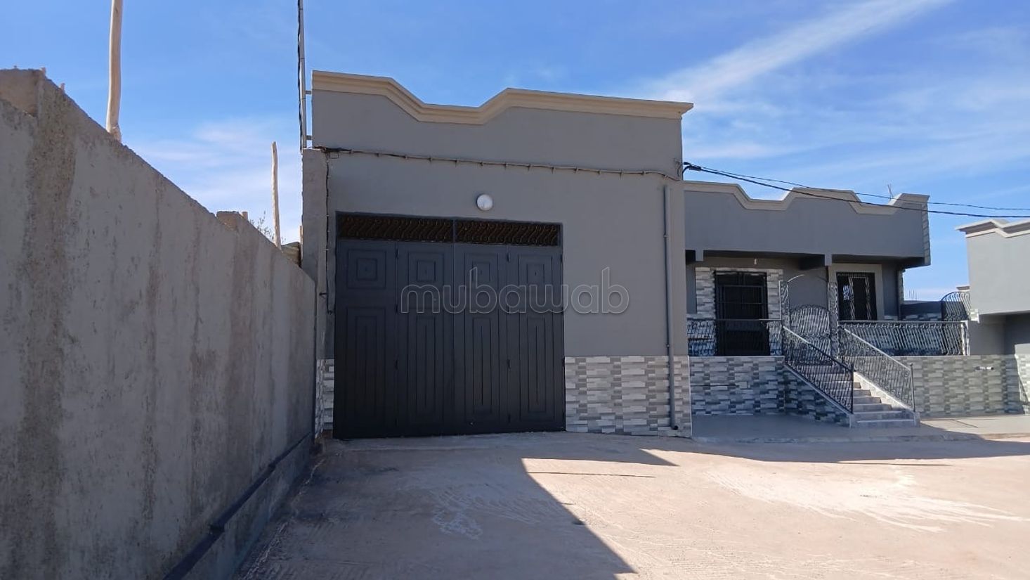 Terreno con 3 casas en venta