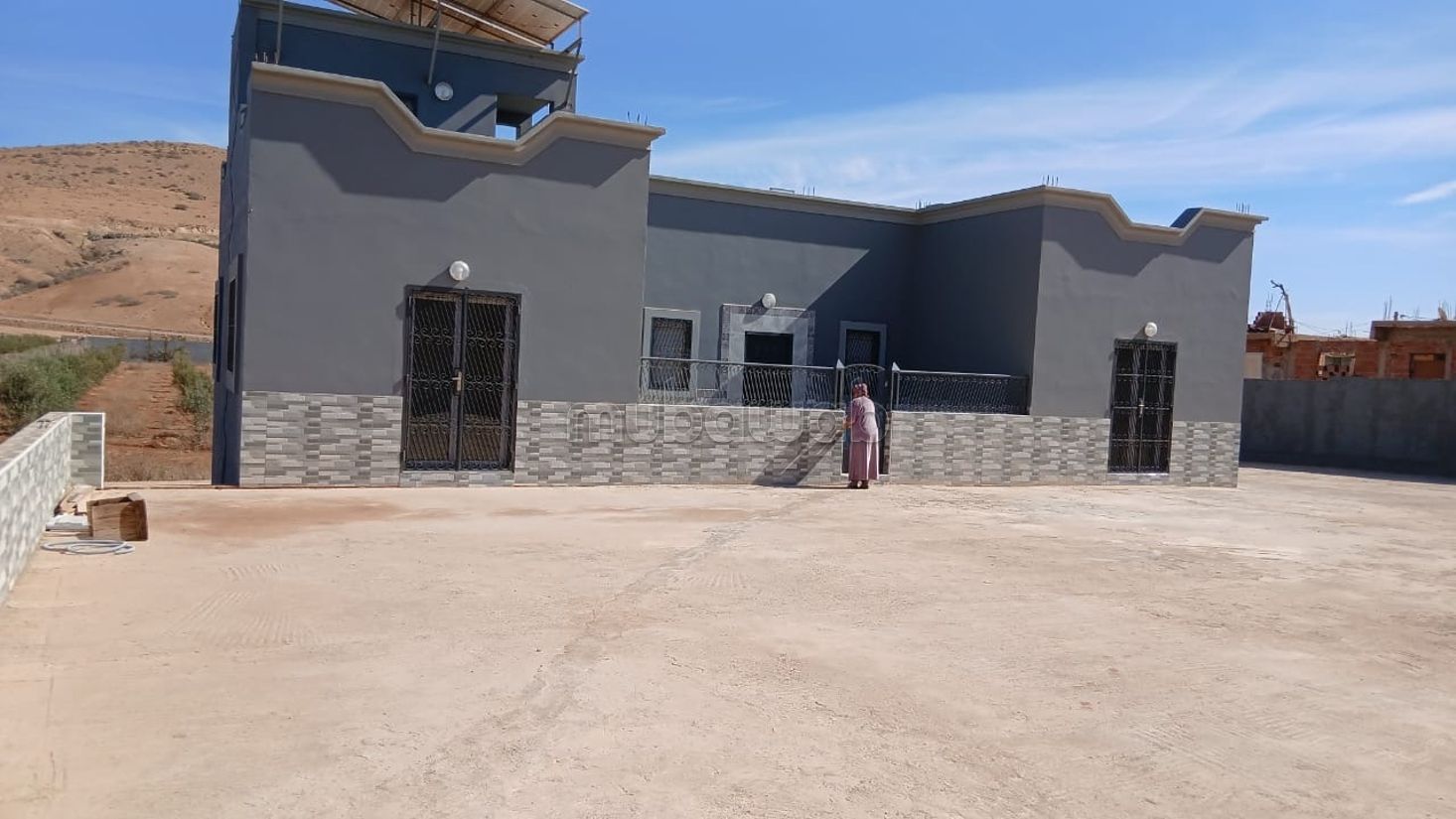 Terreno con 3 casas en venta