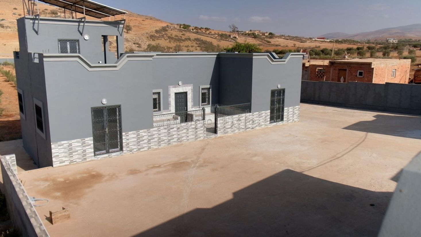 Terreno con 3 casas en venta