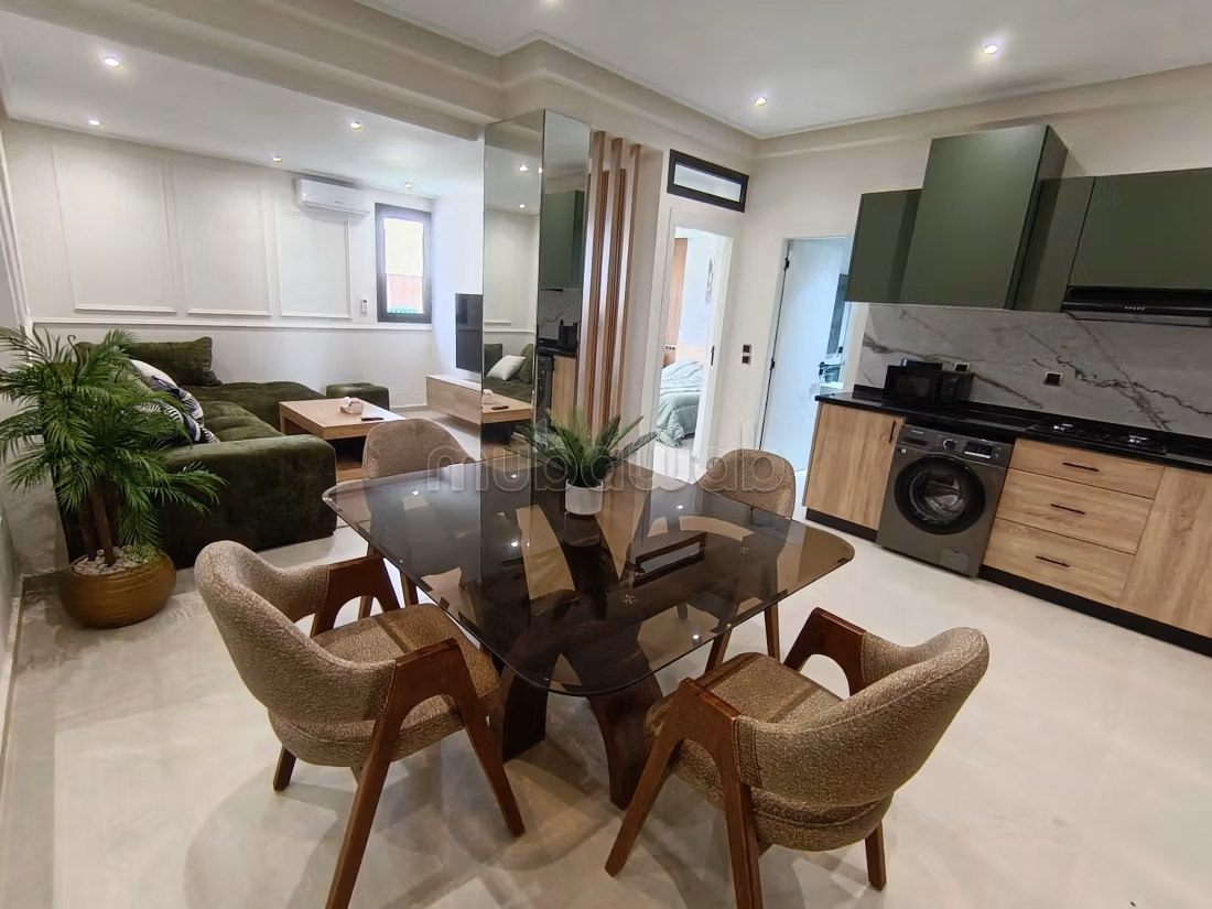 Bel appartement en location à Agdal. 
Superficie 65 m². 
Meublé — 6