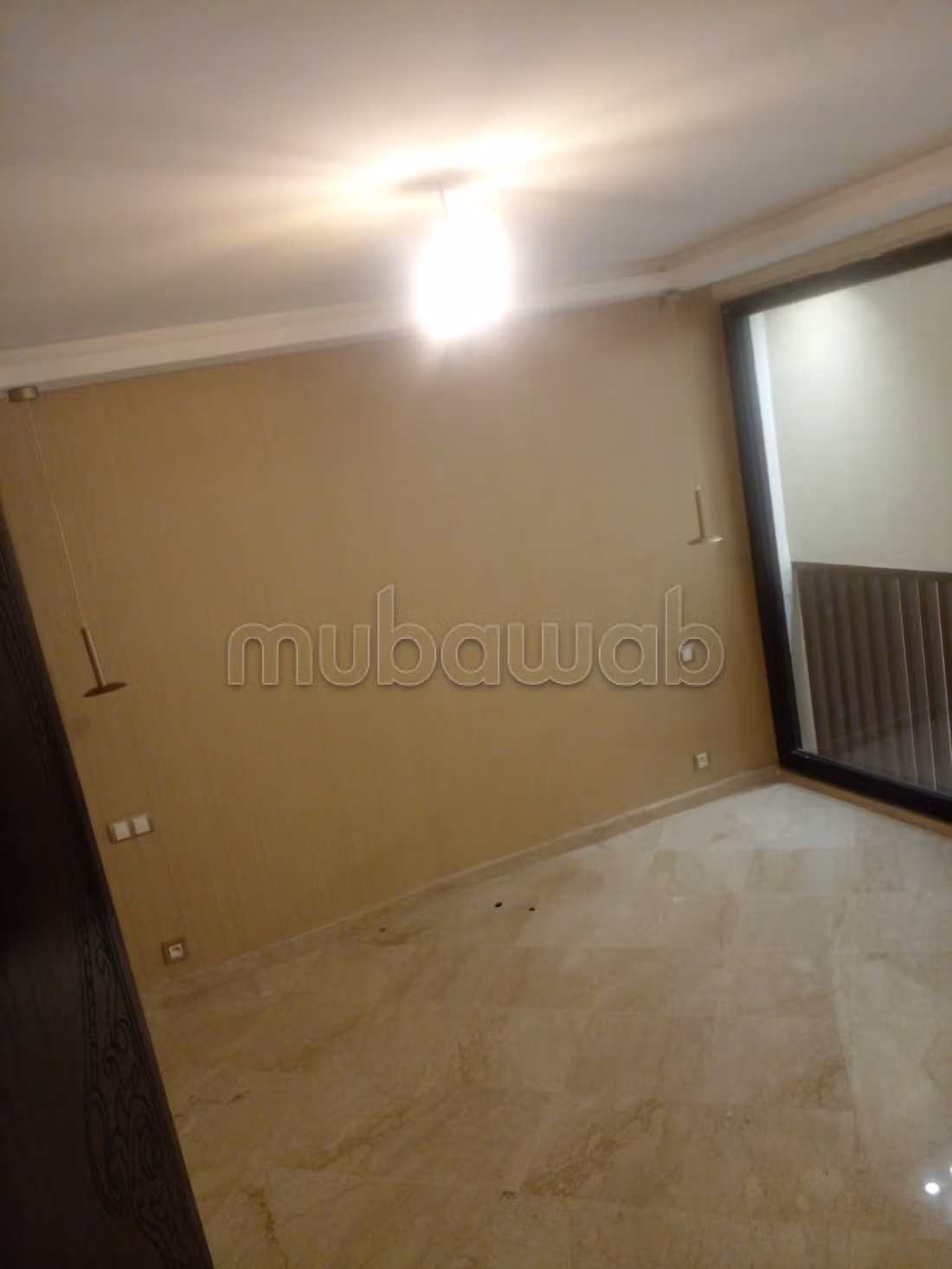 Appartement à vendre à Guéliz.
Surface totale 98 m².
Grande terrasse — 3