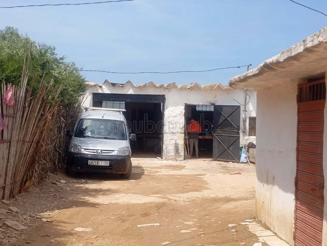 Casa con comercios en venta