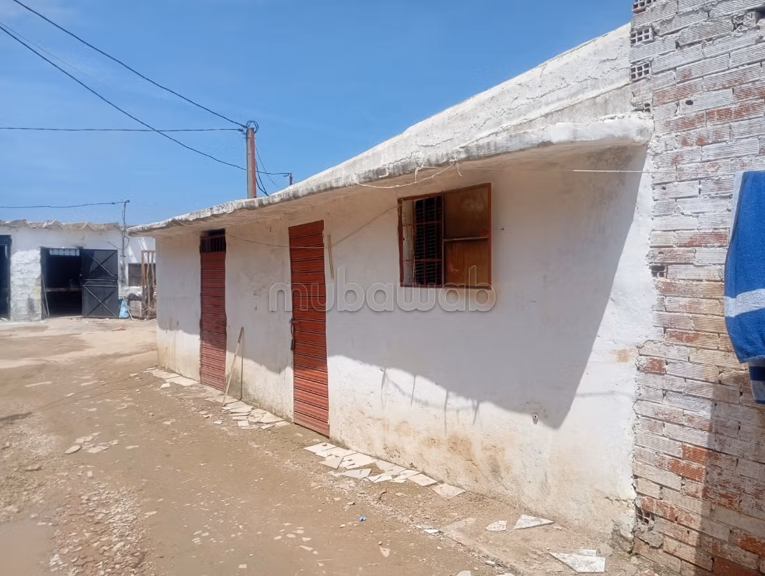Casa con comercios en venta