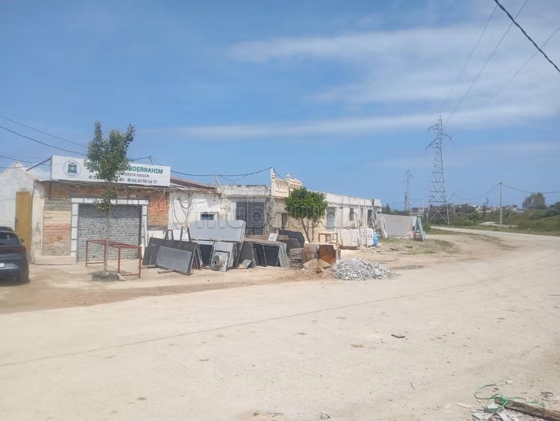 Casa con comercios en venta