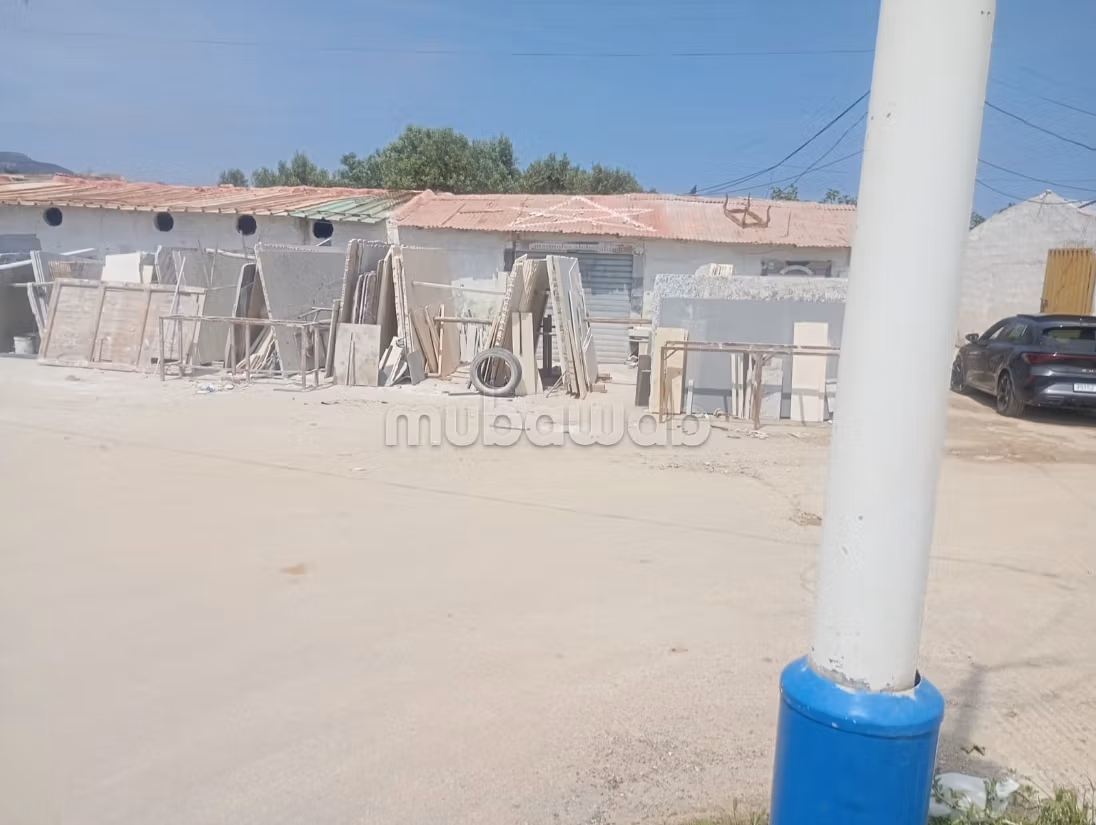 Casa con comercios en venta