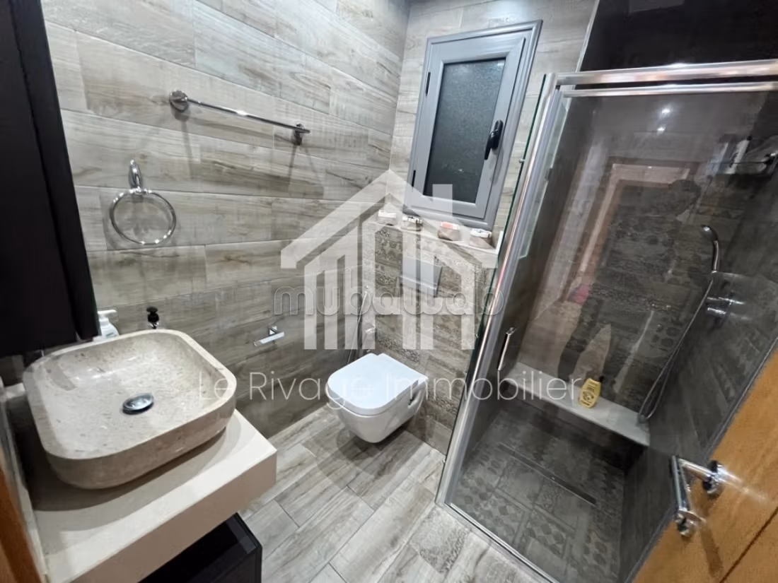 An S1 apartment in Soukra with a large garden