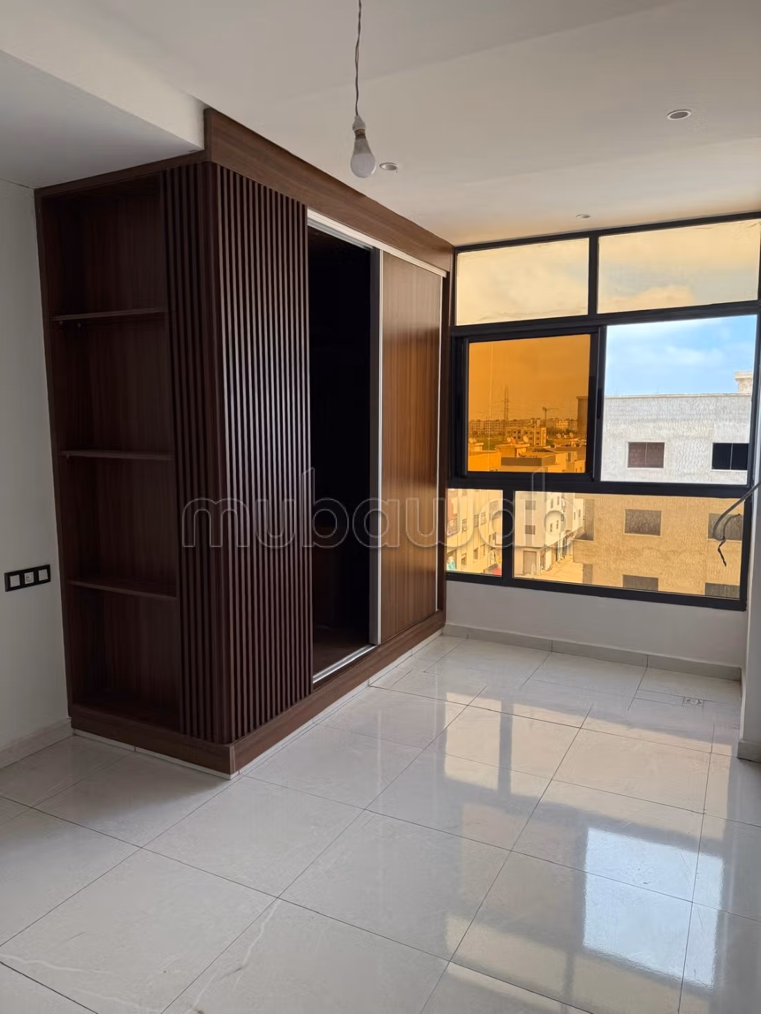 Appartement moderne avec vue ensoleillée et résidence sécurisée à Jnan Znata