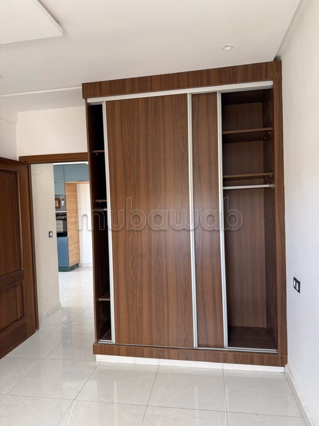 Appartement moderne avec vue ensoleillée et résidence sécurisée à Jnan Znata
