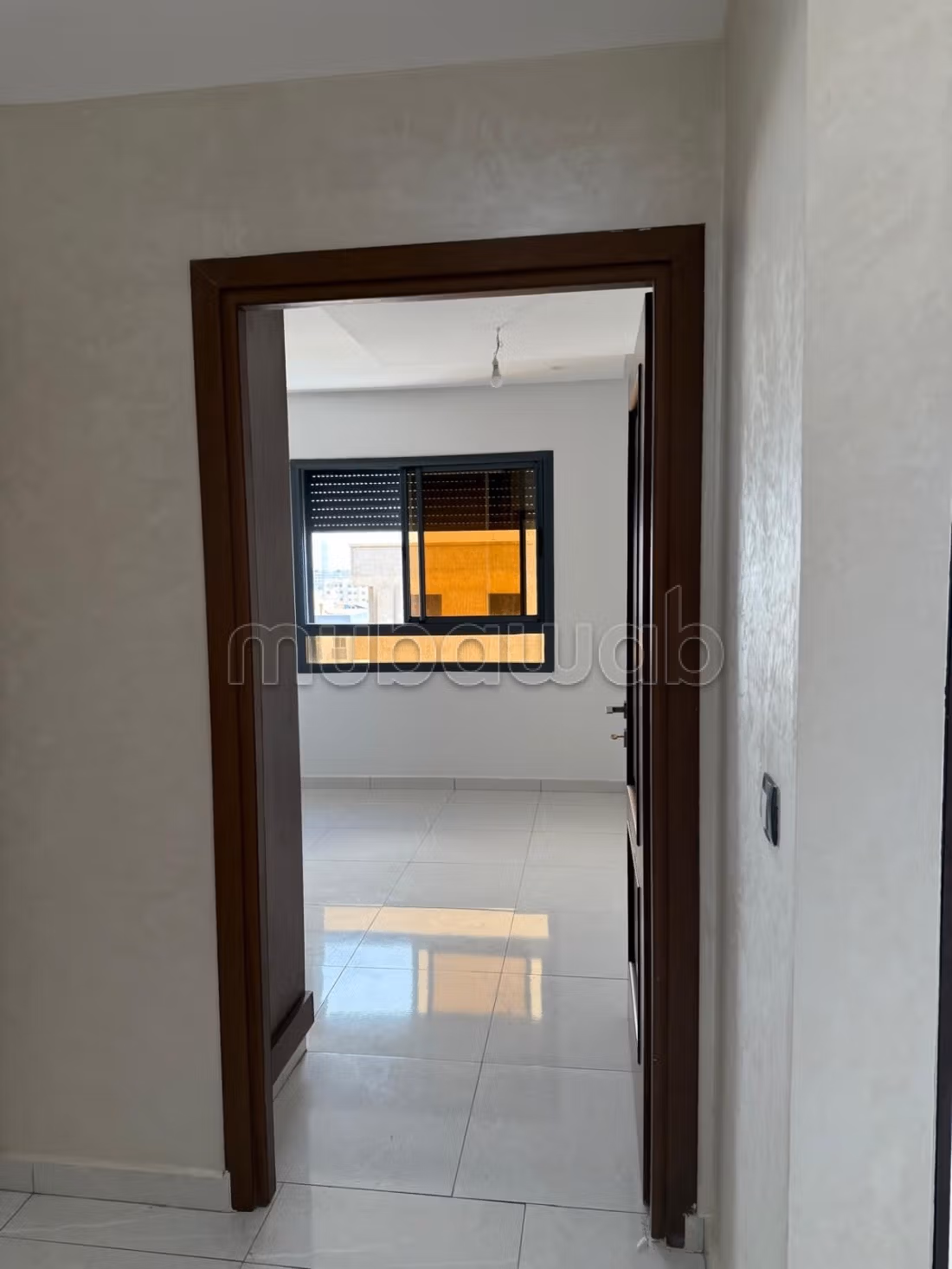 Appartement moderne avec vue ensoleillée et résidence sécurisée à Jnan Znata