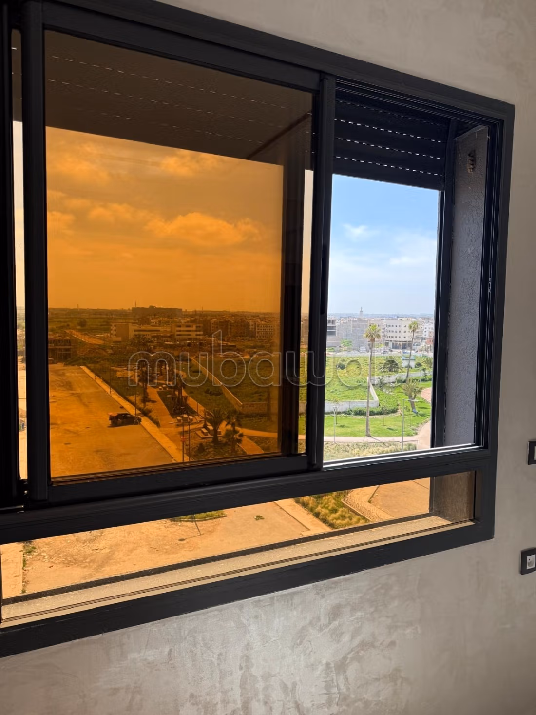 Appartement moderne avec vue ensoleillée et résidence sécurisée à Jnan Znata