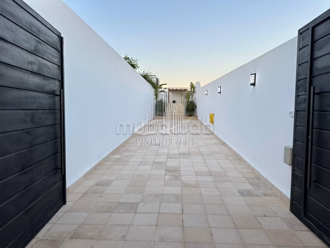 A charming single-storey villa with a pool