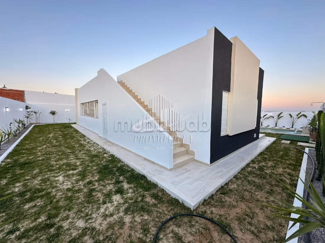 A charming single-storey villa with a pool