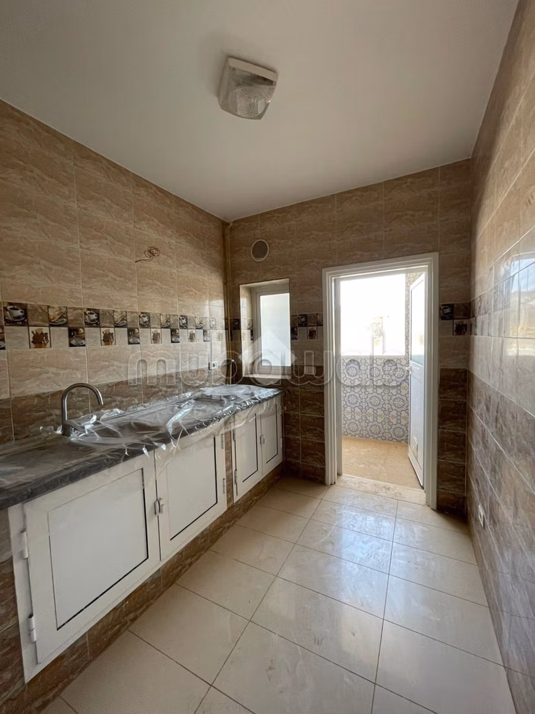 Maison jumelée en vente