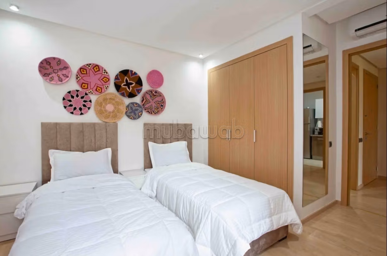 Appartement à vendre à Agdal. 
Surface totale 77 m². 
Meublé — 3
