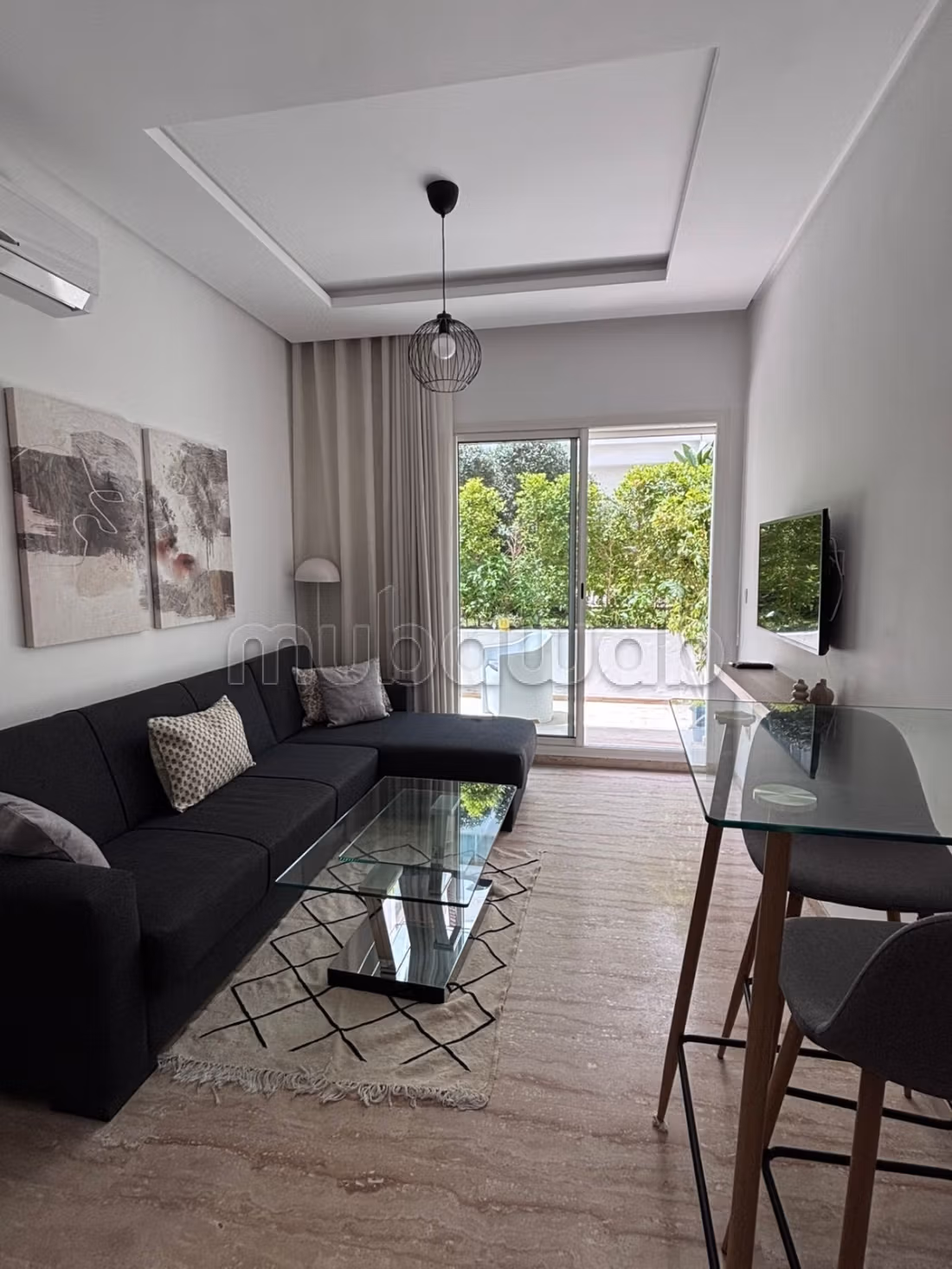 Direct Proprio Appartement moderne meublé avec terrasse ensoleillée et parking