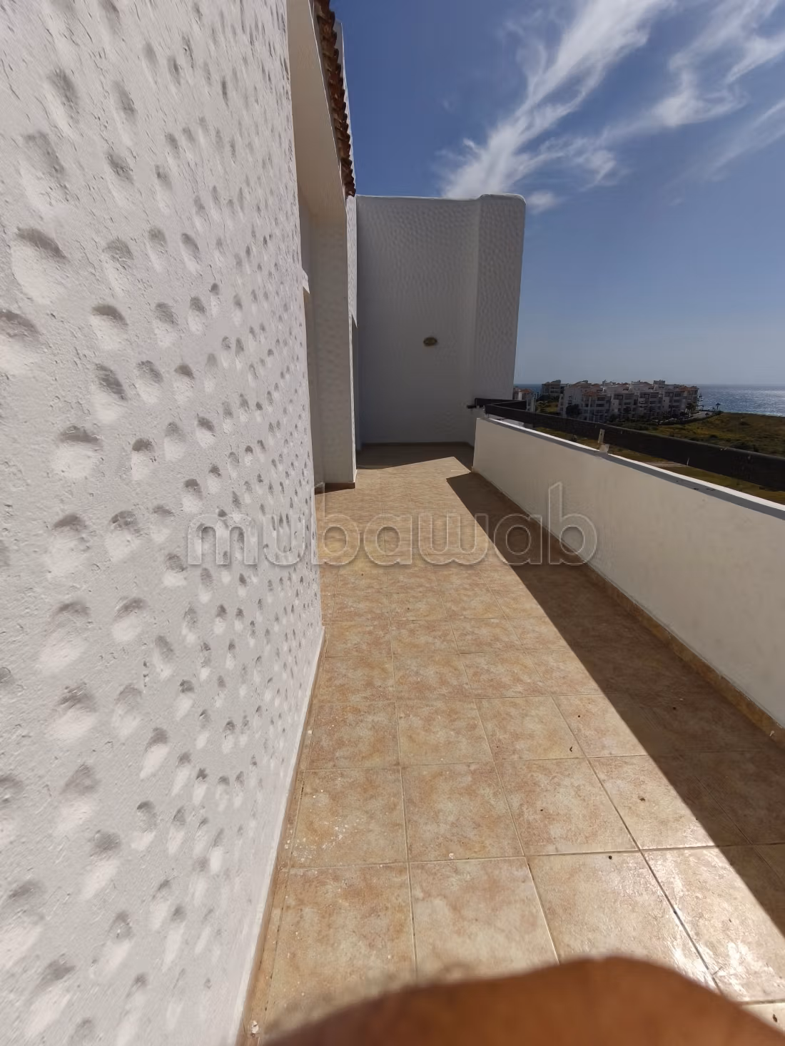 Bel appartement à vendre à Asilah. Surface totale 98 m². Cuisinière avec four