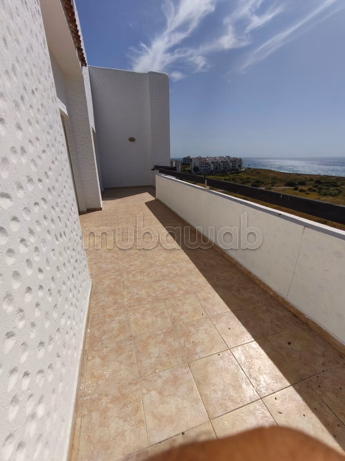 Bel appartement à vendre à Asilah. Surface totale 98 m². Cuisinière avec four