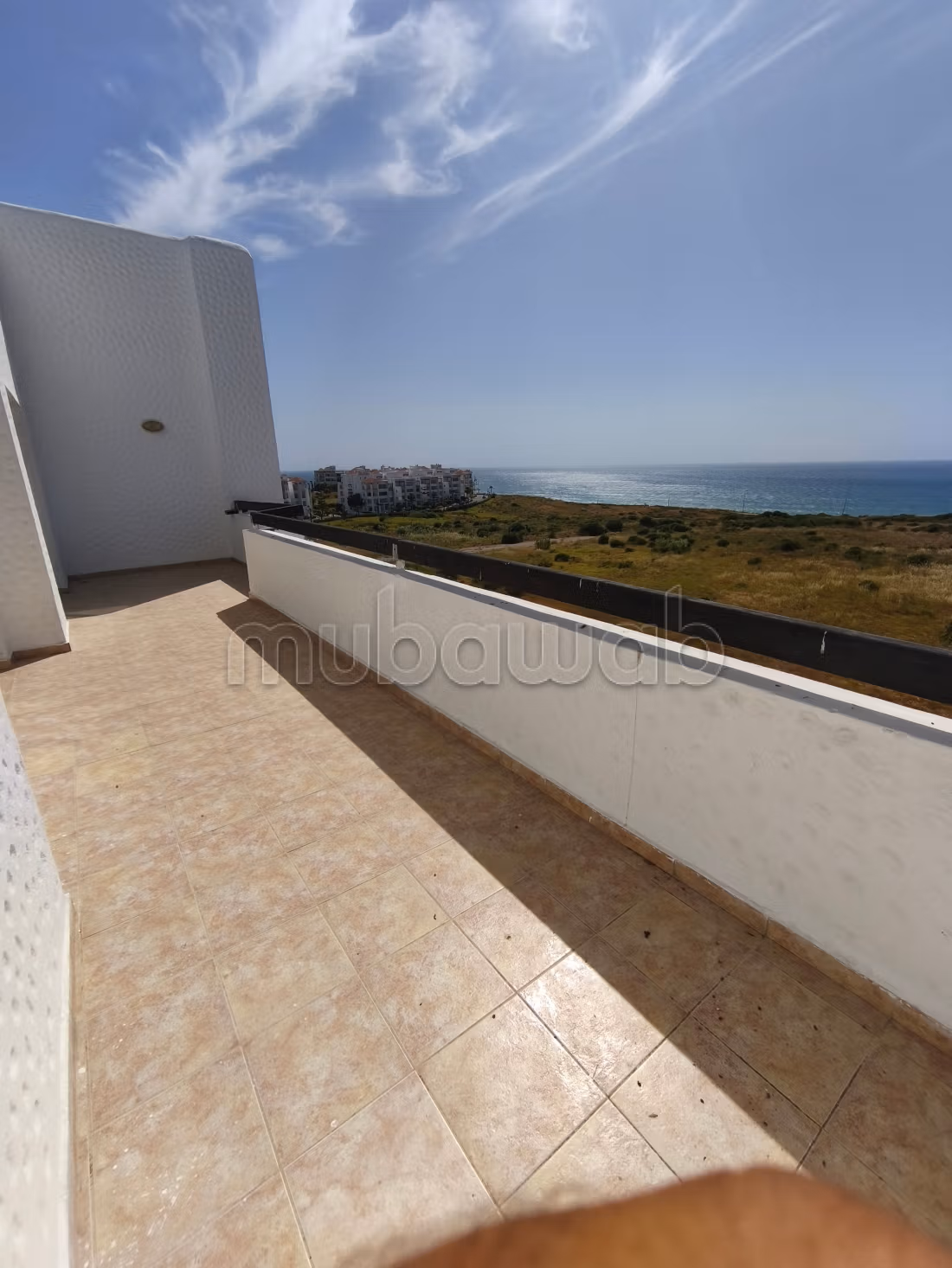 Bel appartement à vendre à Asilah. Surface totale 98 m². Cuisinière avec four