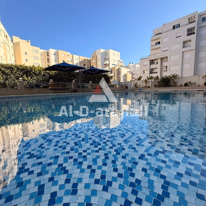 S2 con accesso a piscina comune e giardino privato