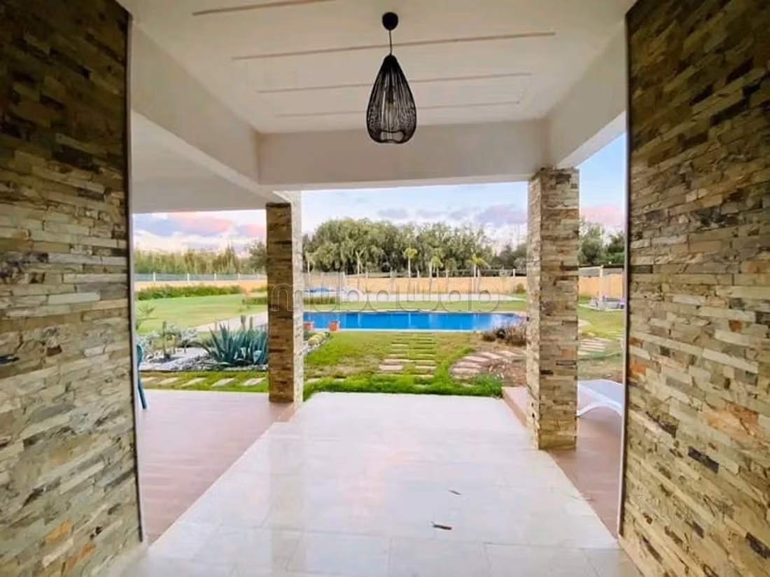 Maravillosa granja en venta en Sidi Rahal Playa. Área total de 10,000 m². Garaje