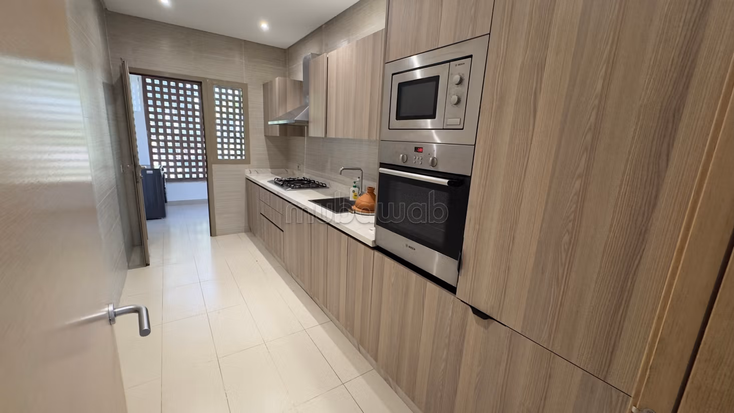 Appartement vide 2 chambres vue piscine à louer longue durée prestigia golf city Marrakech — 4
