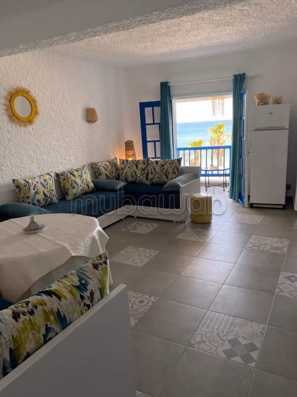 Location saisonnière à Cabo Negro. 1 chambre. Salon traditionnel et système d'antenne parabolique