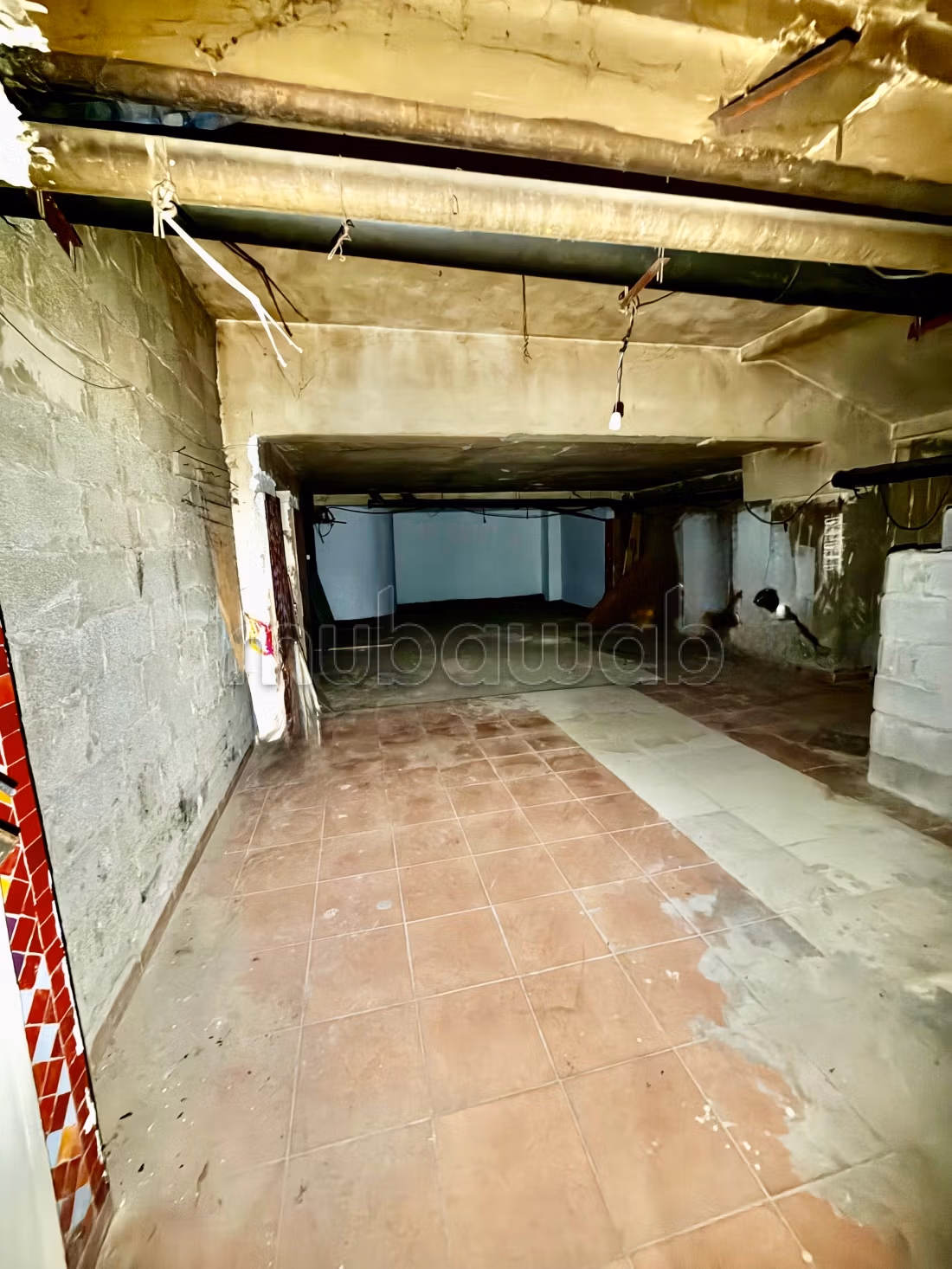 Local commercial à l'achat à Allal El Fassi. Surface 50 m² sol et 150 m² cave. Porte blindée, sécurité