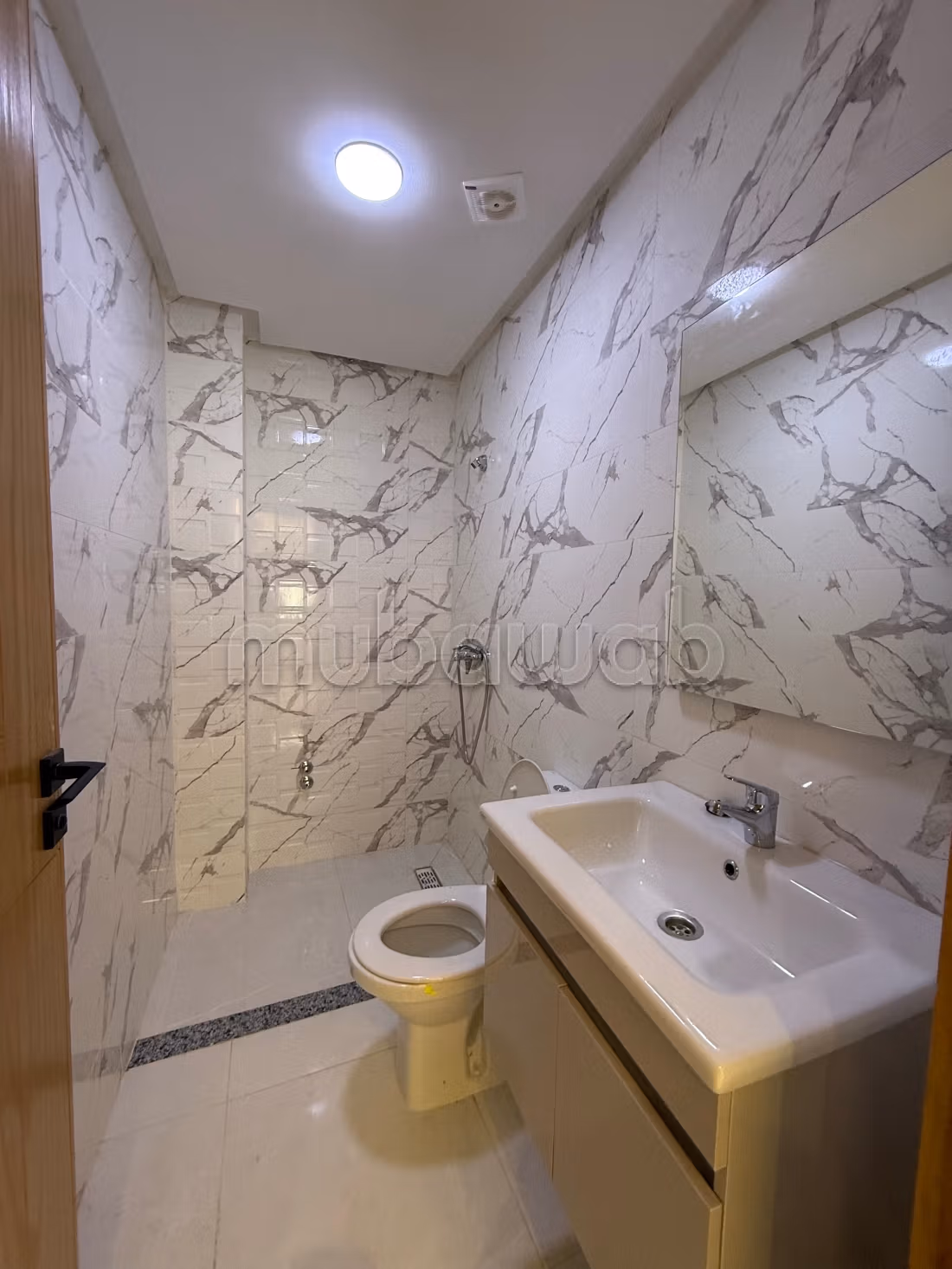 Venta de apartamento en Sidi Rahal Beach. Superficie 63 m². Puerta resistente, salón marroquí tradicional.