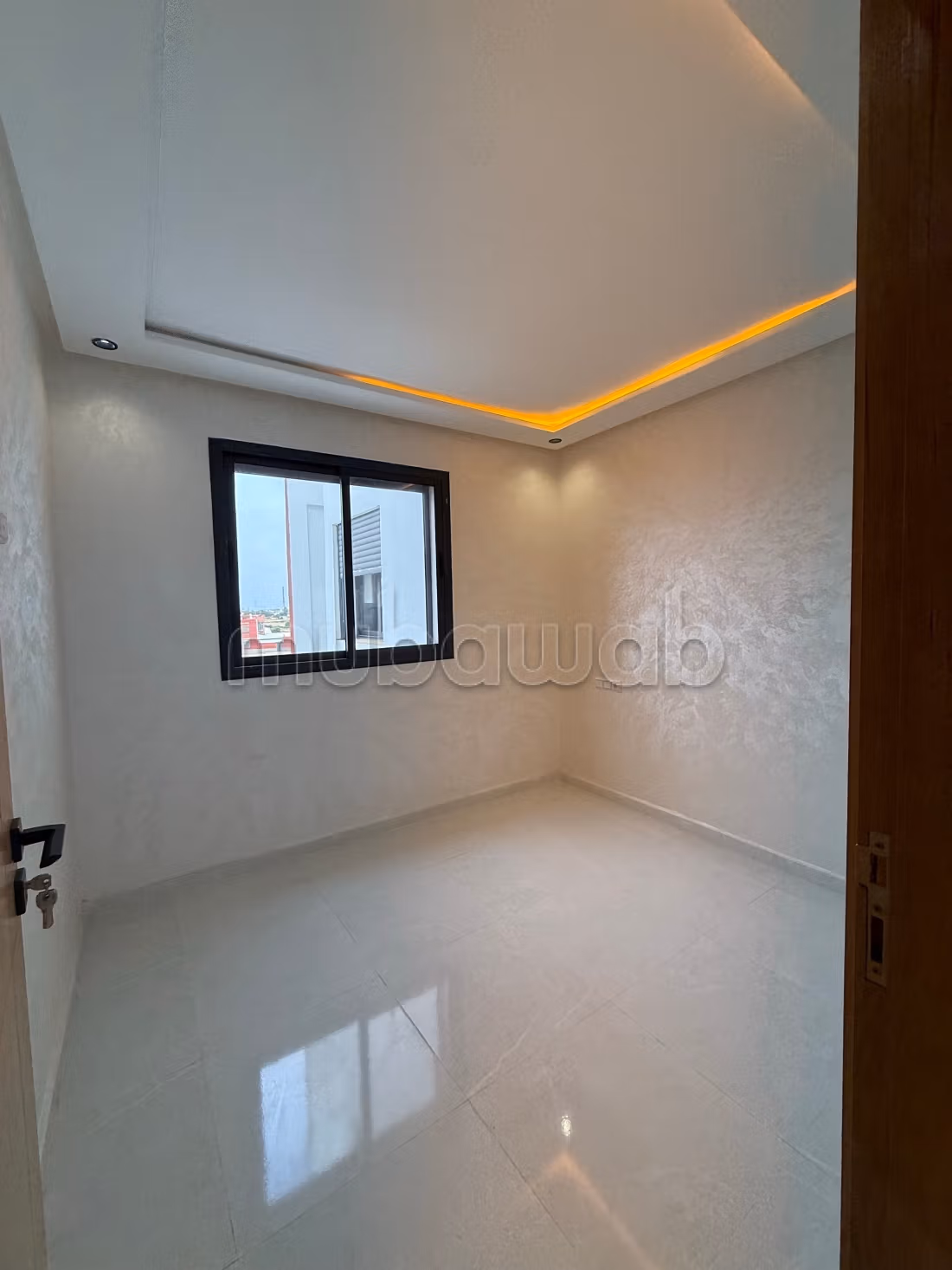 Venta de apartamento en Sidi Rahal Beach. Superficie 63 m². Puerta resistente, salón marroquí tradicional.