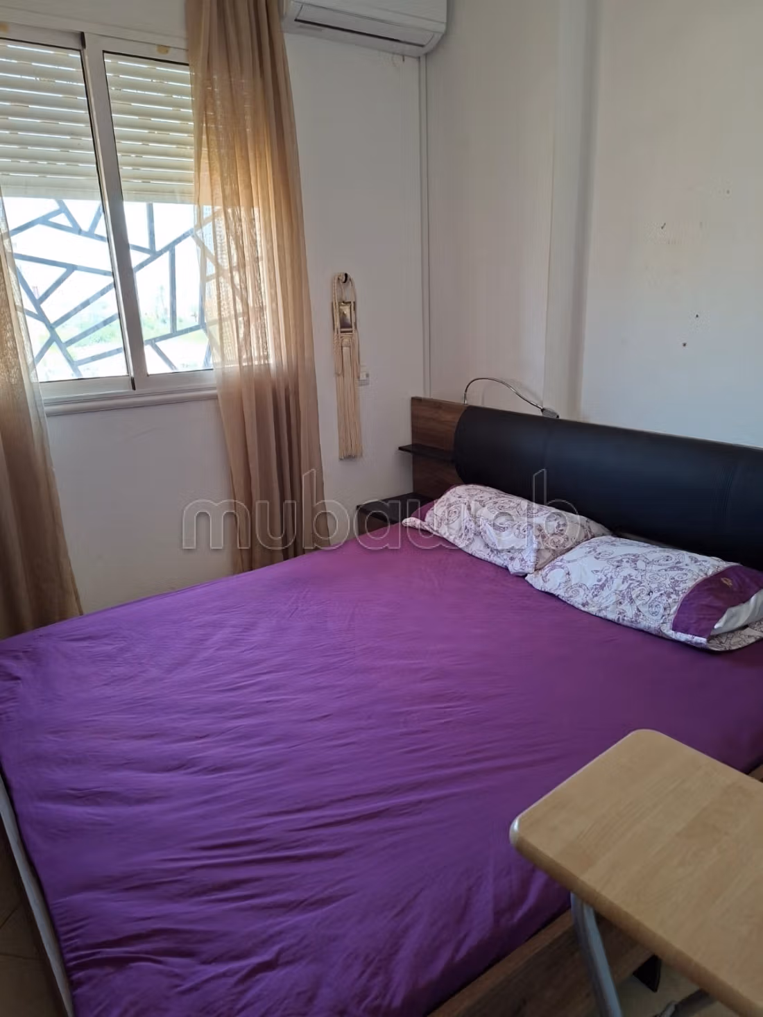 Louez cet appartement à Ouasis. 2 chambres. Bien meublé