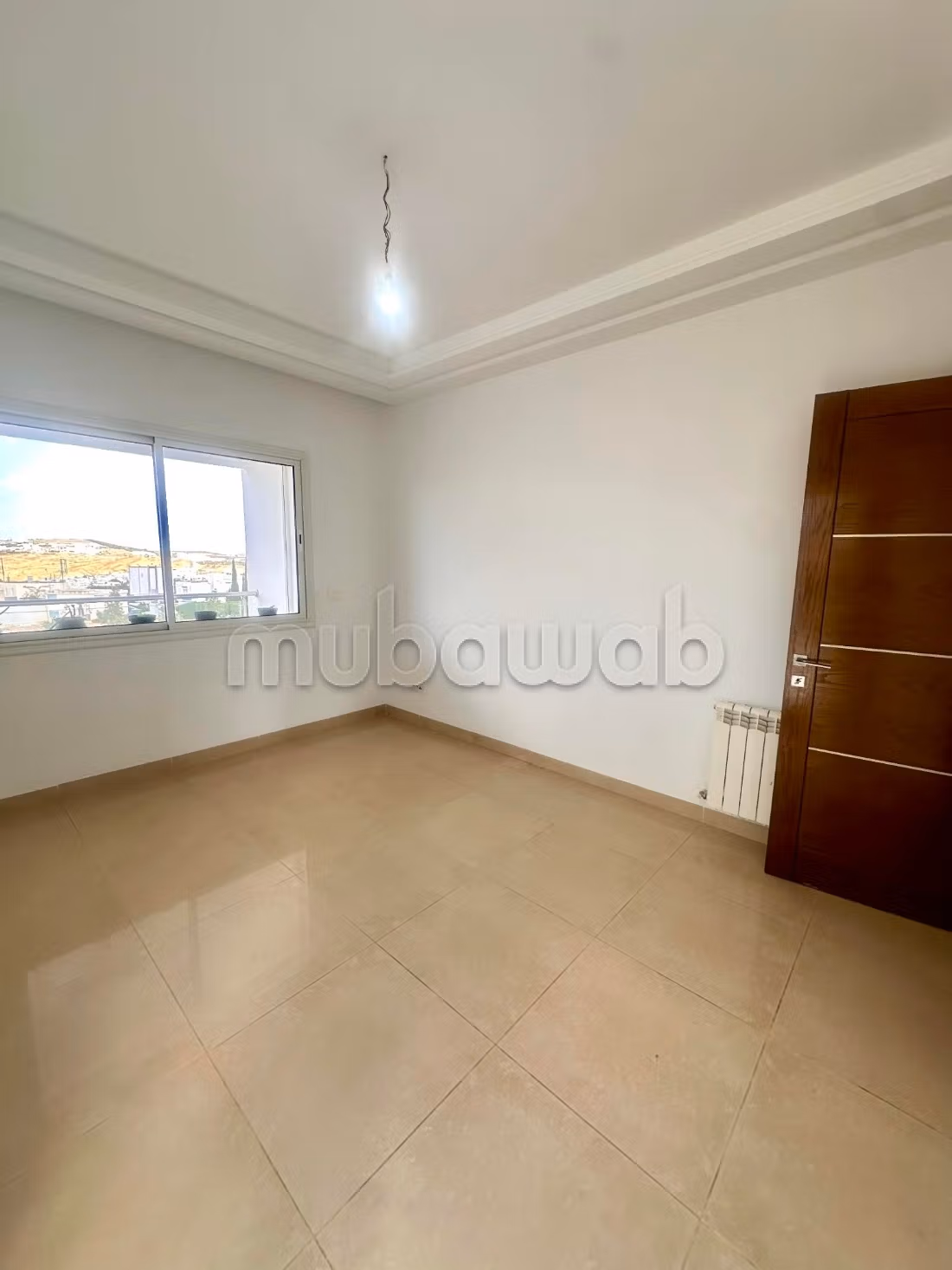 Appartement en vente à El Menzah 
1 chambre. Porte blindée et chauffage central