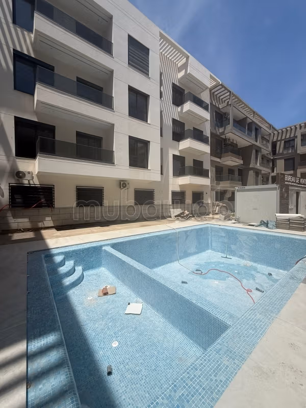 Bel appartement à vendre à Martil. 2 chambres. Service de conciergerie, belle piscine