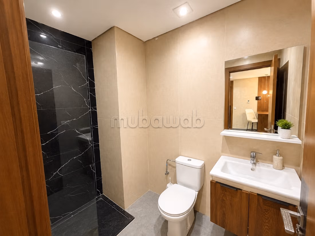 Studio a rocce nere con vista mare