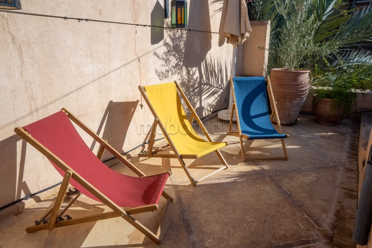 Titled 4 bedroom Riad Against Bahia Palace garden
