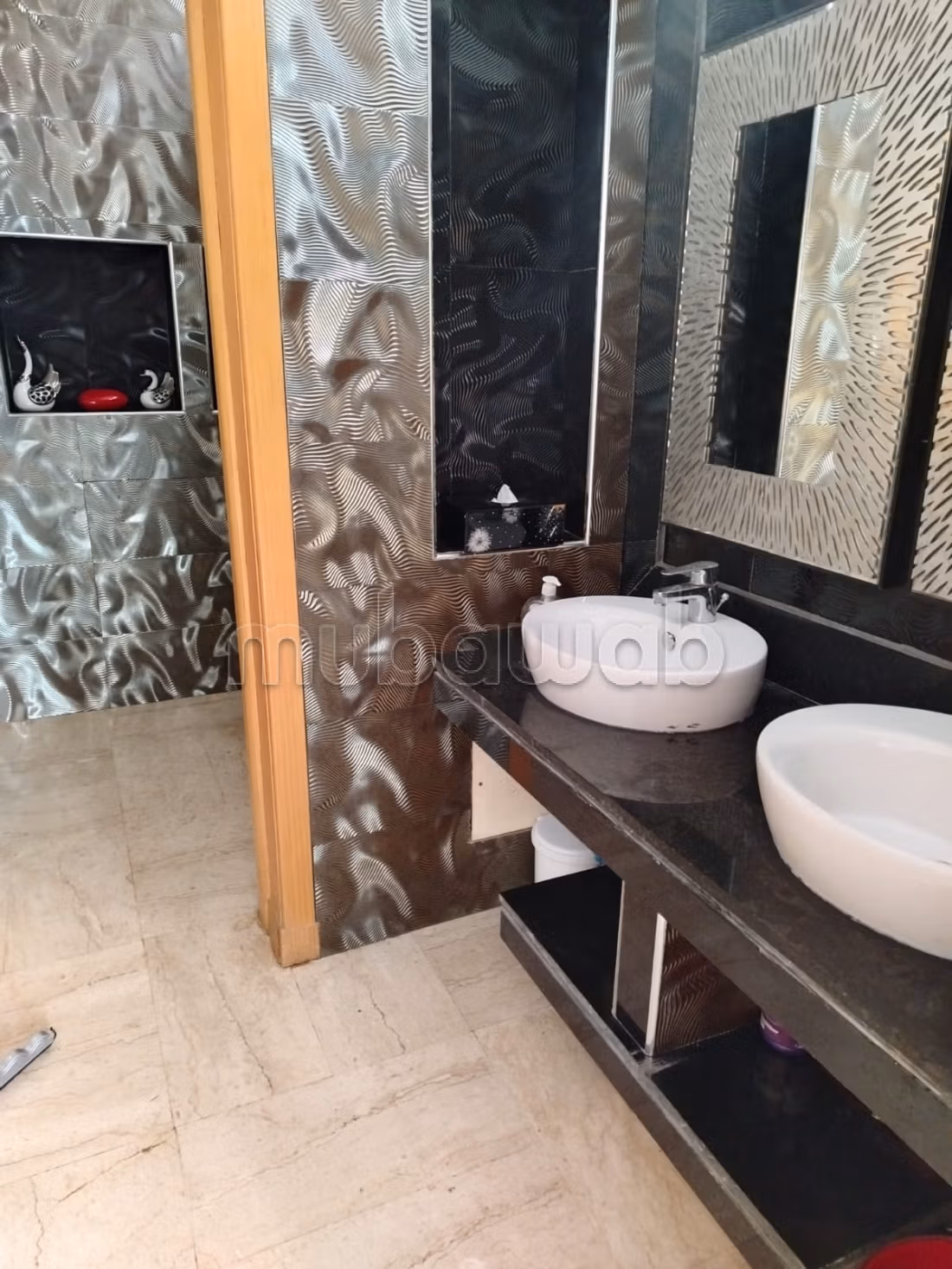 Villa a la location meublé a ain Diab 450000dh