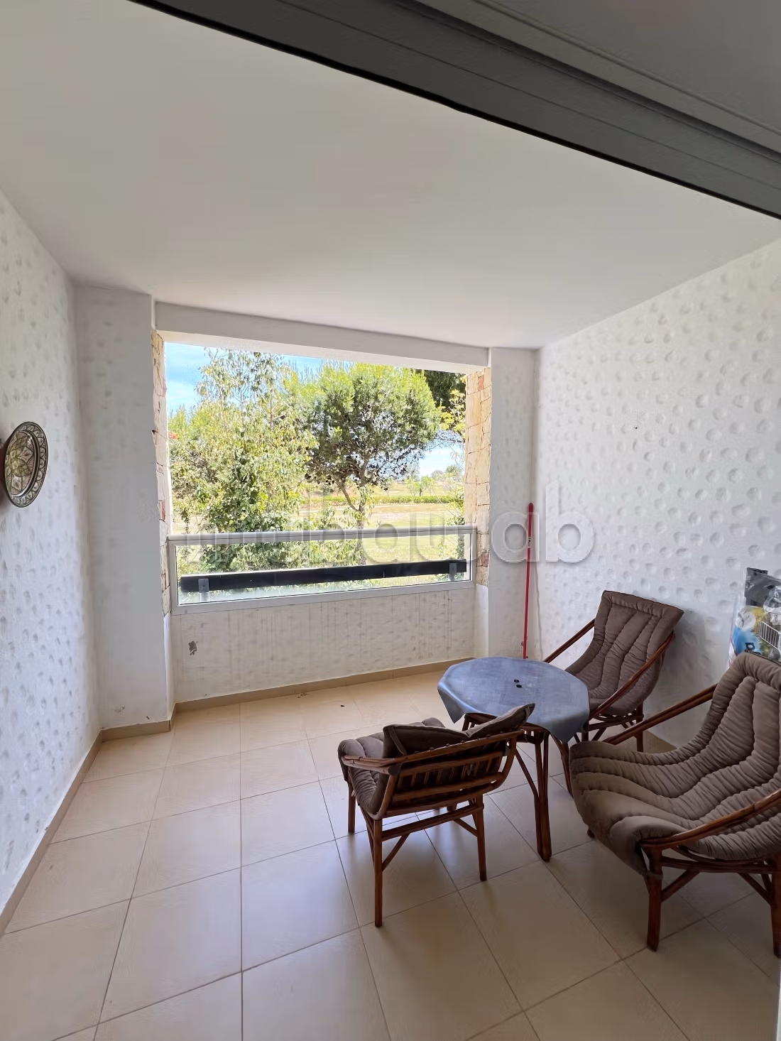 Apartment location in Asilah. 2 pleasant bedrooms. With elevator and green space