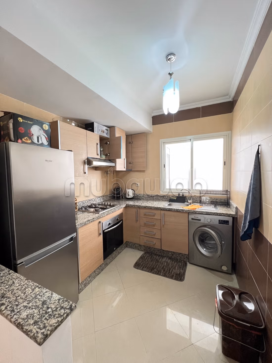 Apartment location in Asilah. 2 pleasant bedrooms. With elevator and green space