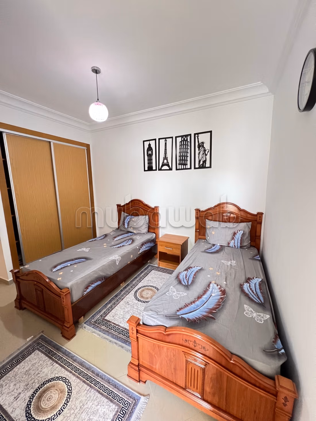 Apartment location in Asilah. 2 pleasant bedrooms. With elevator and green space