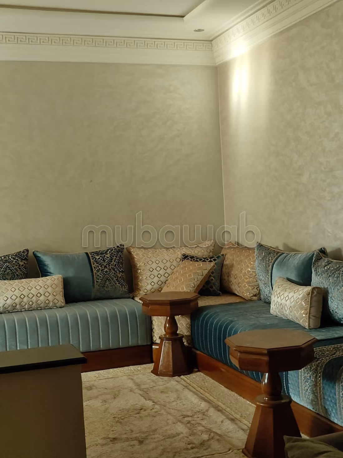 Appartement en vente à Berrechid. Surface totale 99 m². Salon traditionnel marocain, résidence sécurisée